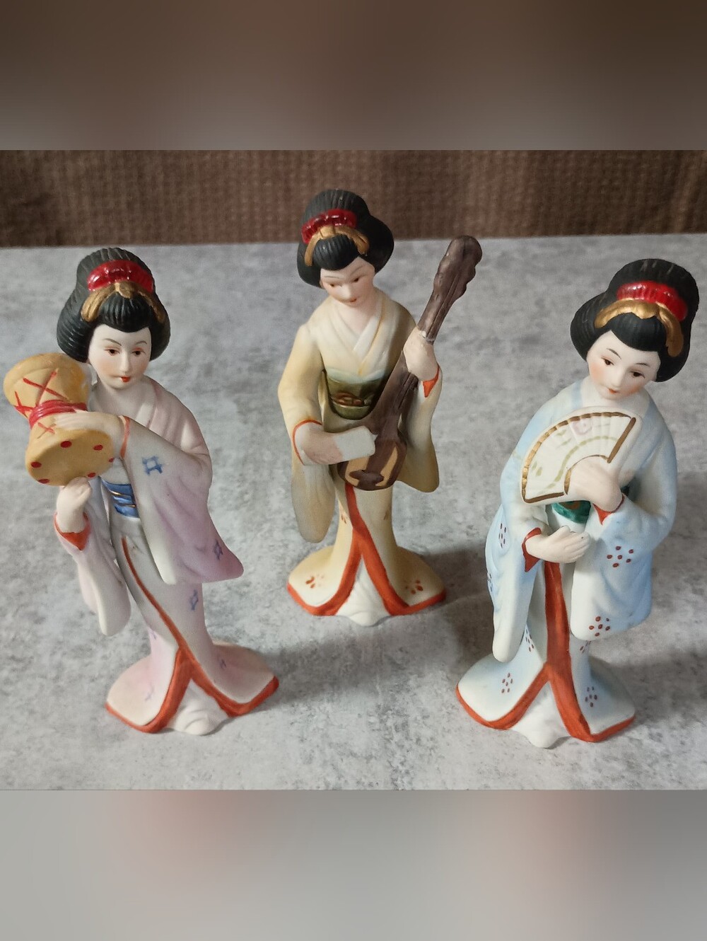 Set of 3 Porcelain Geisha Figurines in Pastel Pink, Cream, and Light Blue